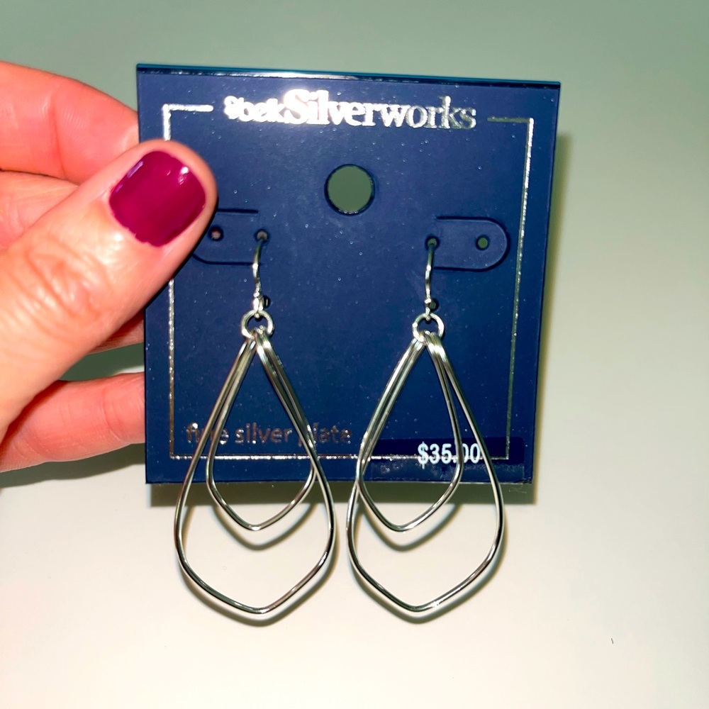 New, never been worn silver plated earrings